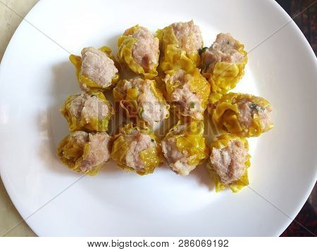 Chinese Food Style, Top View Of Pork Chinese Steamed Dumpling (shumai) On White Plate, Dim Sum Is Ch