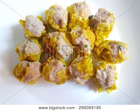 Chinese Food Style, Top View Of Pork Chinese Steamed Dumpling (shumai) On White Plate, Dim Sum Is Ch