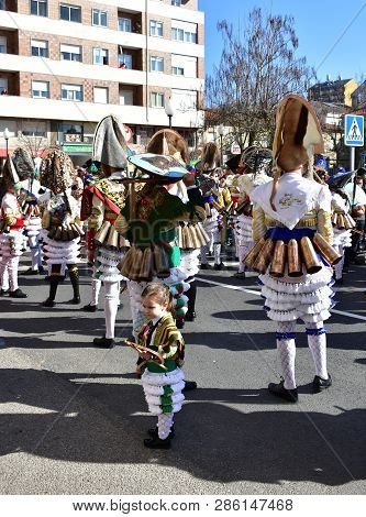 Verin, Spain, 24 Feb 2019. Famous Carnival And Street Parade With Cigarrons Costumes. Ourense Provin