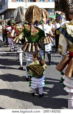 Verin, Spain, 24 Feb 2019. Famous Carnival And Street Parade With Cigarrons Costumes. Ourense Provin