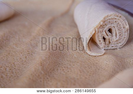 Injera Is A Sourdough Flatbread Made From Teff Flour.  It Is The National Dish Of Ethiopia, Eritrea,