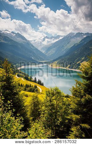 Charming view of the Durlassboden reservoir. Location municipality of Gerlos, Zillertal valley, Austrian states of Tyrol and Salzburg, Europe, High Tauern National Park. Discover the beauty of earth.