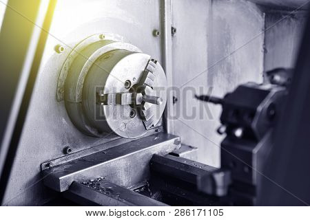 Spindle Chuck And Installed Metal Part On High Precision Cnc Industrial Lathe Turning Machine. Close