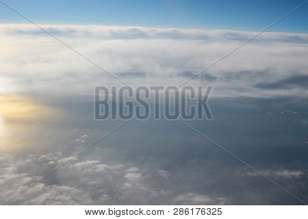 View Above The Earth At The Clouds Below