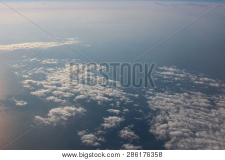 View Above The Earth At The Clouds Below