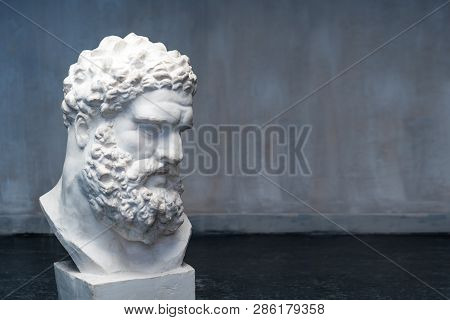 Bust Of The Farnese Hercules. Heracles Head Sculpture, Plaster Copy Of A Marble Statue. Son Of Zeus,