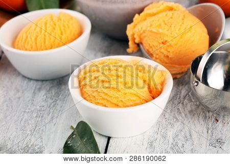 Scoop Of Tangarine Orange Ice Cream. Delicious Icecream Set
