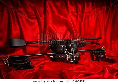 Close Up Bdsm Outfit. Bondage, Kinky Adult Sex Games, Kink And Bdsm Lifestyle Concept With A Pair Of