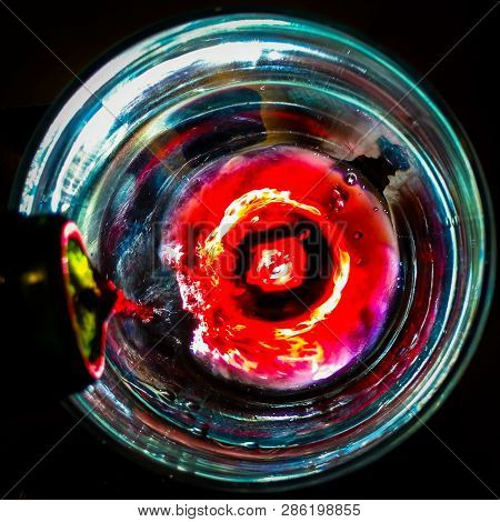Wine Service In A Glass With Light From Below.