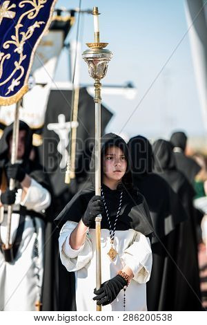 Caceres, Extremadura, Spain - April 08, 2017: The Dominican Brotherhood Of The Holy Christ Of The Vi