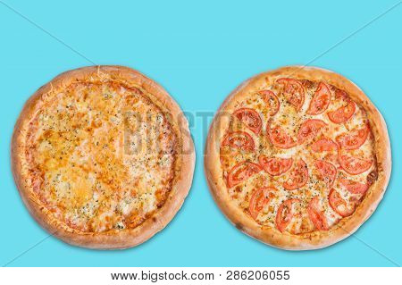 Two Vegetarian Italian Pizzas On A Turquoise Background, Copy Space, Concept