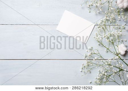 Blank Card For Invitation Or Congratulation, Little Gift Box, Bunch Of Gypsophila Flowers On Light B