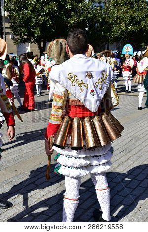 Verin, Spain, 24 Feb 2019. Famous Carnival And Street Parade With Cigarrons Costumes. Ourense Provin