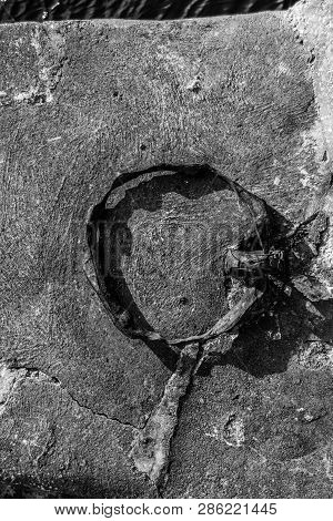 Rusted Old Mooring Ring In The Harbour Wall At Portsoy