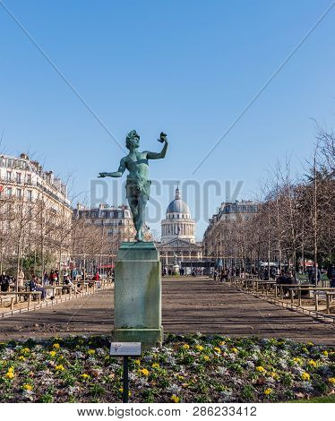 Paris, France - February 25 2019: Greek Actor Statue In The Luxembourg Garden In Winter With The Pan