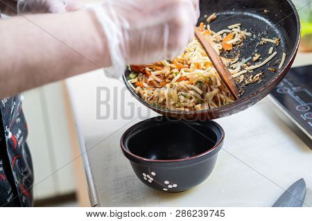 Japanese Ramen Soup With Chicken, Egg, Chives And Sprout On Dark Wooden Background.