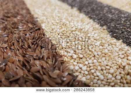 Healthy Superfood: Flax Seeds, Chia Seeds And Quinoa Seeds Close-up