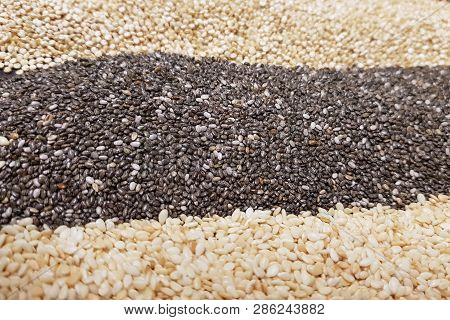Healthy Superfood: Flax Seeds, Chia Seeds And Quinoa Seeds Close-up