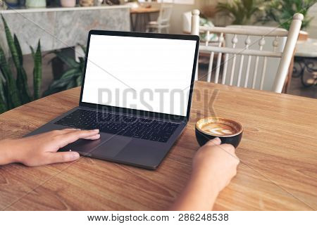 Mockup Image Of Woman's Hands Typing And Touching On Laptop Touchpad With Blank White Desktop Screen