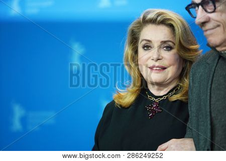 Catherine Deneuve and Andre Techine pose at the 'Farewell To The Night' photocall during the 69th Berlinale Festival Berlin at Grand Hyatt Hotel on  February 12, 2019 in Berlin, Germany. 