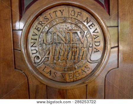 Las Vegas -  February 5, 2010:  University Of Nevada, Las Vegas Unlv Alumni Emblem On Wood Door At T
