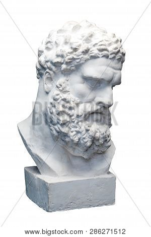 Bust Of The Farnese Hercules. Heracles Head Sculpture, Plaster Copy Of A Marble Statue Isolated On W