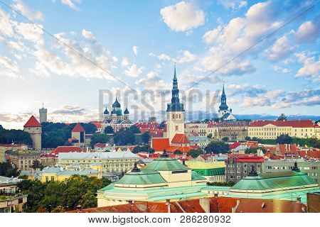 Tallinn, Estonia. Cityscape Skyline Of Old Town Of Touristic City Tallinn. Red Roofs And Colorful Cl