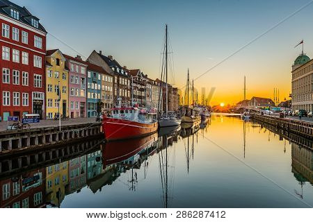 The Tranquil Water Of The Copenhagen Harbor Nyhavn An Early Morning At Sunrise, Copenhagen, February
