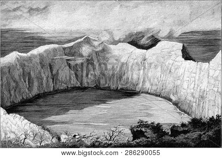 Crater of the Soufriere in St Vincent Island, vintage engraved illustration. From the Universe and Humanity, 1910.