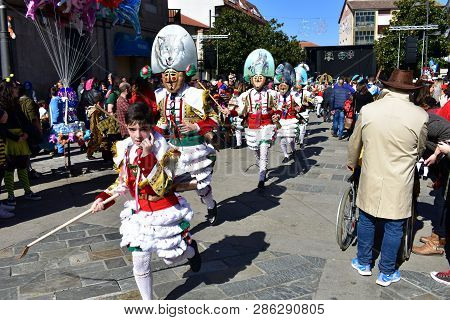 Verin, Spain, 24 Feb 2019. Famous Carnival And Street Parade With Cigarrons Costumes. Ourense Provin