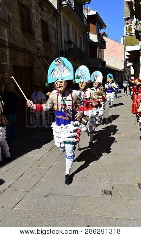 Verin, Spain, 24 Feb 2019. Famous Carnival And Street Parade With Cigarrons Costumes. Ourense Provin