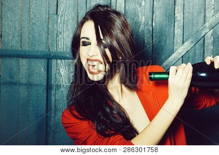 Sensual Elegant Attractive Young Woman With Long Lush Brunette Hair In Stylish Jacket With Wine Bott