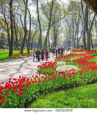 Istanbul, Turkey: People Walking In Gulhane Park During The Annual April Tulip Festival On April 16,