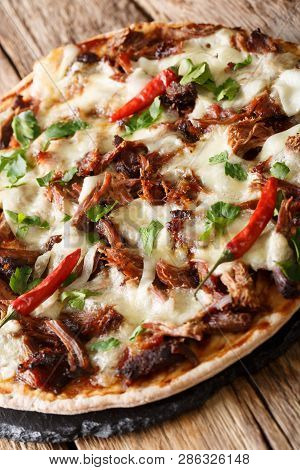 Delicious Pizza With Pulled Pork, Mozzarella And Barbecue Sauce Close-up. Vertical