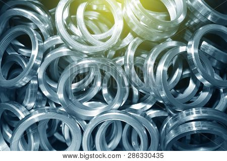 Round Rings With Internal Thread For Valve Manufacture In The Factory. Many Round Rings For Industri