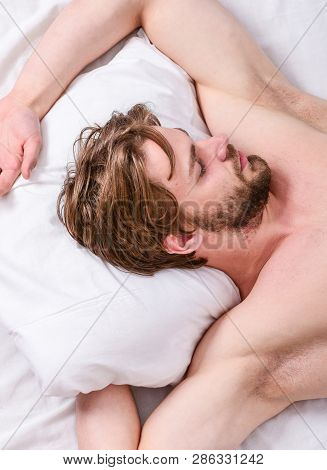 Bearded Man Sleeping Face Relaxing On Pillow. How Much Sleep You Actually Need. Man Handsome Guy Lay