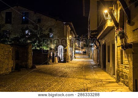 Plaza De Mayor In Santillana Del Mar, Cantabria, Spain. Typical Architecture In The Main Square Of S