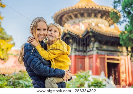 Enjoying Vacation In China. Mom And Son In Forbidden City. Travel To China With Kids Concept. Visa F