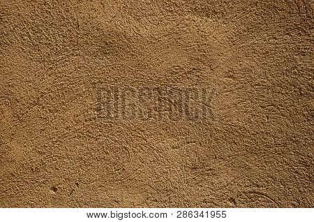 Wall With Small Gravel Inserted Into The Plaster