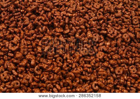 Corn-flakes Background And Texture. Top View. Cornflake Cereal Box For Morning Breakfast.