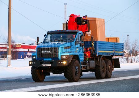 Novyy Urengoy, Russia - February 22, 2019: Flatbed Truck Ural 4320 Next At The Interurban Road.