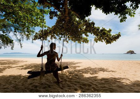 Tropical Summer Yoga Session On Beautiful Sunset Beach, Koh Kradan Island In Thailand. Vriksha Asana