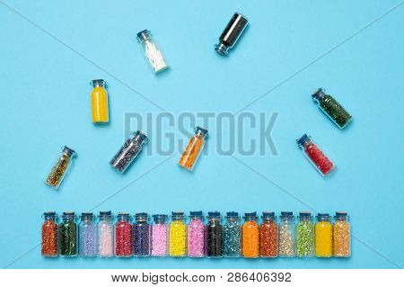 Colored Beads In Special Glass Jars. Female Or Kids Hobby