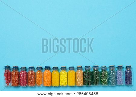 Colored Beads In Special Glass Jars. Female Or Kids Hobby
