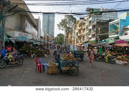 Ho Chi Minh City, Vietnam - August 25, 2017: Stall Vendors Selling Produce At Cho Xom Chieu Local Ma