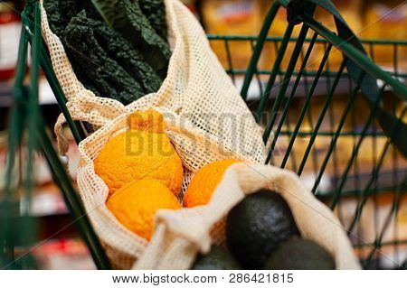 Reusable Produce Mesh Bags Full Of Fresh Vegetables And Fruits In The Cart At Store, Zero Waste Eco 