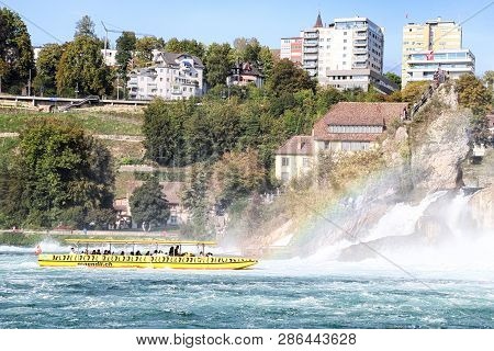 Rhine, Switzerland - September 19, 2018: Tourist Ship On The Rhine River Approaching The Rhine Falls