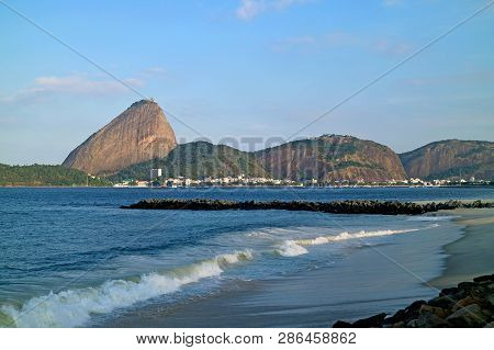 Sugarloaf Mountain And Urca Hill, Famous Natural Monument In The City Of Rio De Janeiro, Brazil
