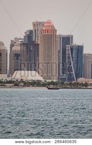 DOHA, QATAR - January 30, 2017: View across Doha Bay. to the towers in Dafna business district at sunset