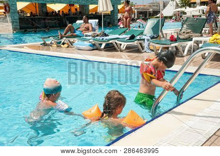 Turkler, Turkey - July 30, 2018: Pool In Senza Hotel. Children Have Fun In Swimming Pool On Vacation
